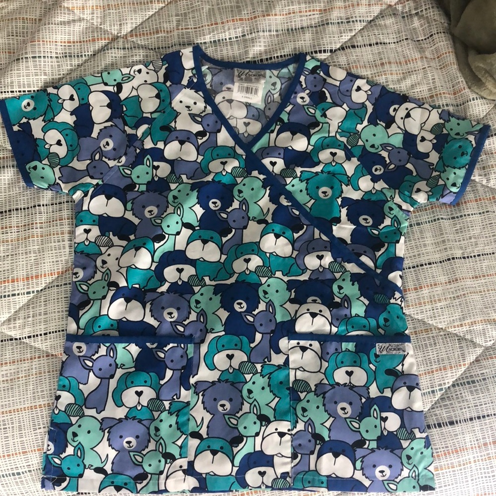 Scrubs, fits big.